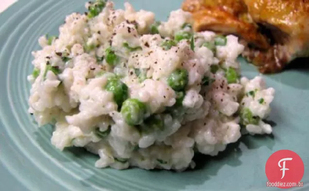 Arroz cremoso com ervilhas e ervas