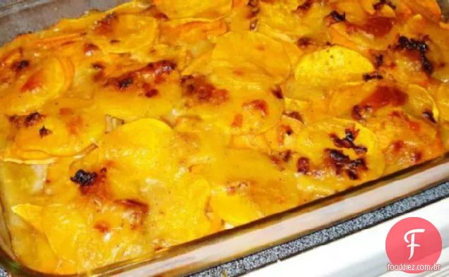 Batatas recortadas e abóbora com alho-poró