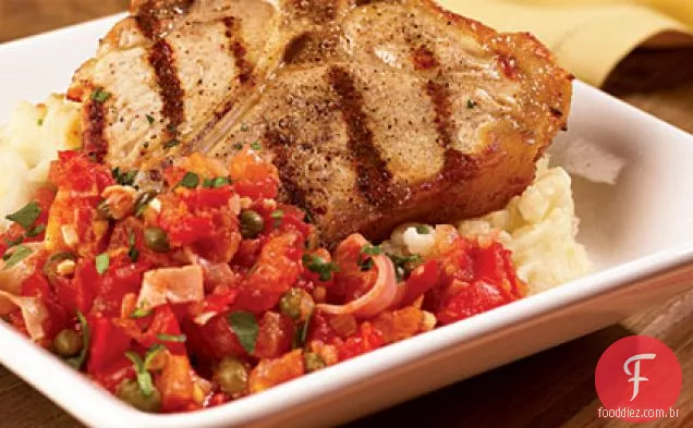Costeletas de vitela grelhadas com molho de tomate Prosciutto