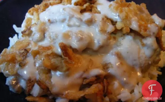 Frango sufocado com molho e arroz