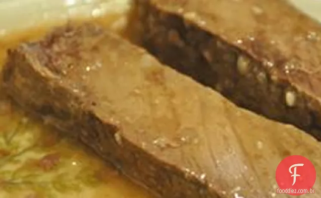 Bife de flanco refogado com limão e alho