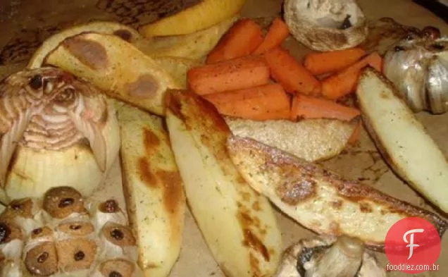 Veggies de jantar de domingo em uma pedra de cozimento