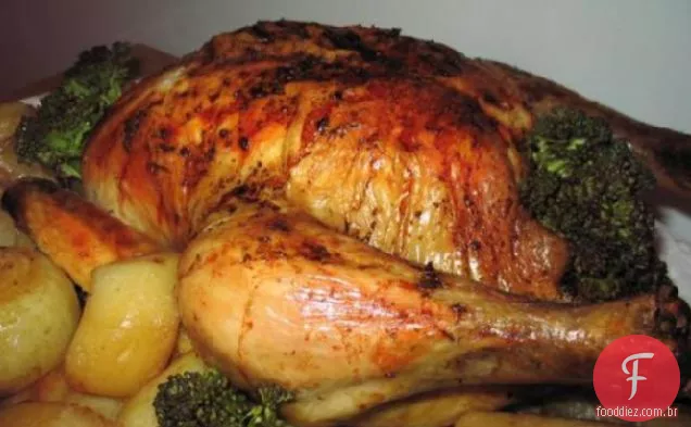 Frango assado grego e batatas