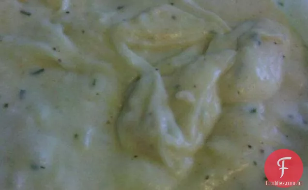 Creme de leite e cebolinha chicoteado batatas