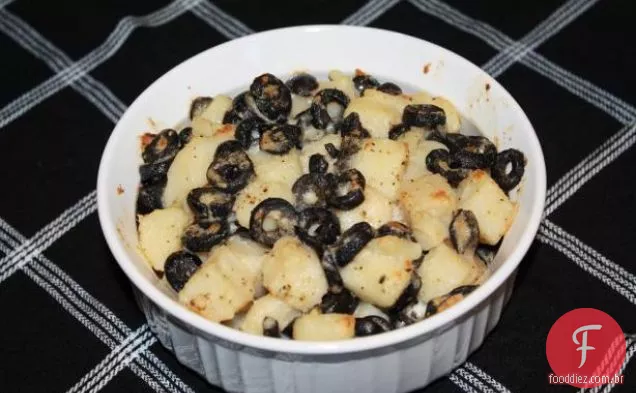Purê de batatas com alho assado e cebola caramelizada