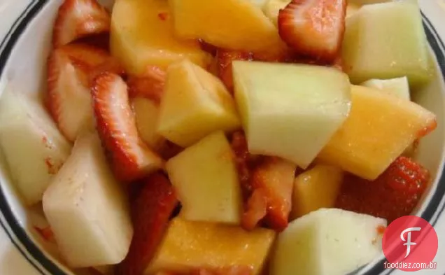 Mistura De Melão De Verão E Molho De Mel De Baga