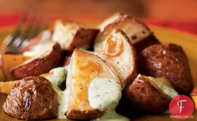 Batatas assadas com molho de agrião picante