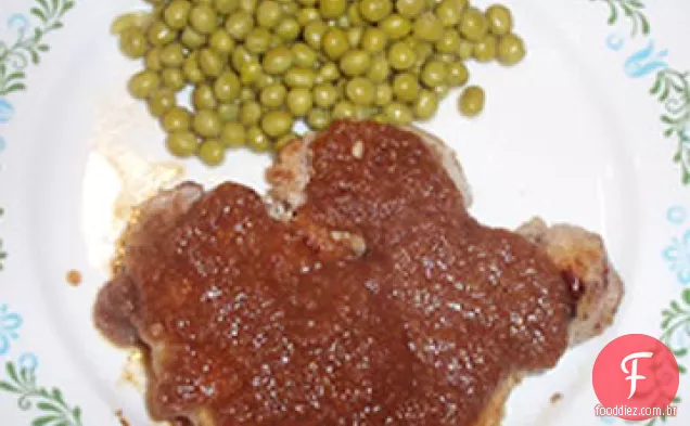 Costeletas de porco com molho de Pêra