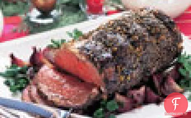 Assado de costela em pé com crosta de pimenta preta au Jus