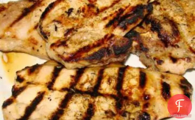 Costeletas de porco grelhadas doces e Garlicky