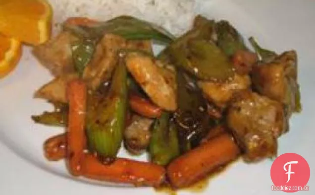 Carne de porco em molho de laranja