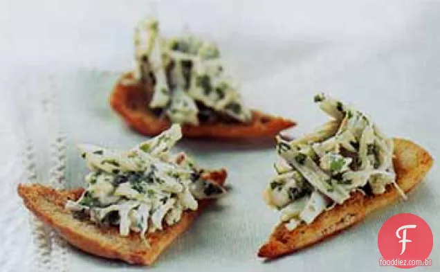 Canapés de caranguejo com cominho