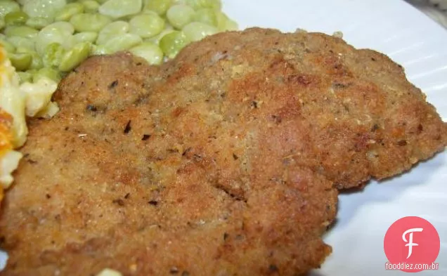 Costeletas De Porco Fritas Com Panificação De Ervas