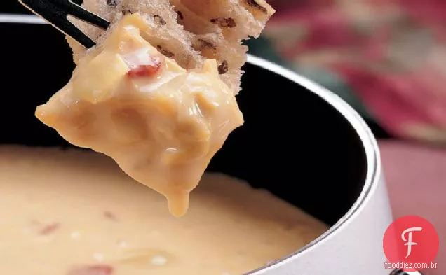 Fondue de queijo e alcachofra