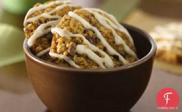 Biscoitos Chewy Cranberry-Oatmeal com cobertura de laranja