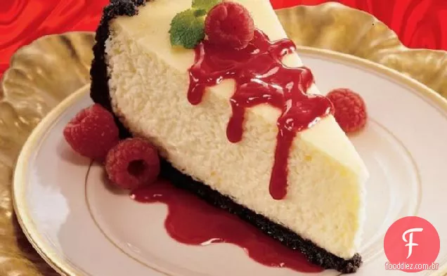 Cheesecake de laranja com molho de framboesa