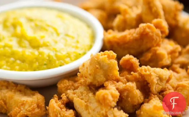 Nuggets de frango frito com caril de coco com molho de Manga