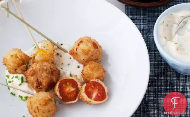 Tomates cereja fritos com iogurte picante