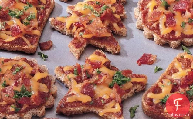 Canapés de queijo e tomate seco ao sol