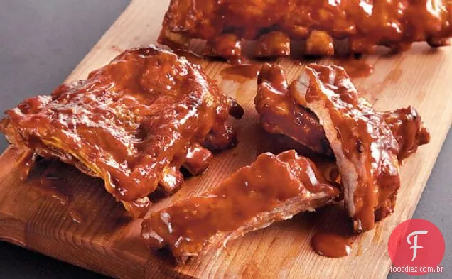 Costelas de churrasco de melaço laranja de fogão lento