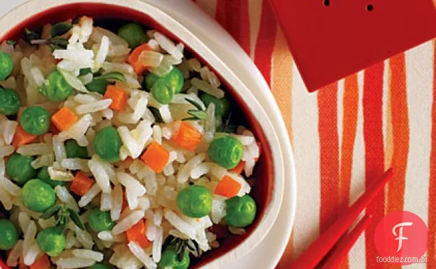 Arroz e ervilhas verdes com manteiga de camarão
