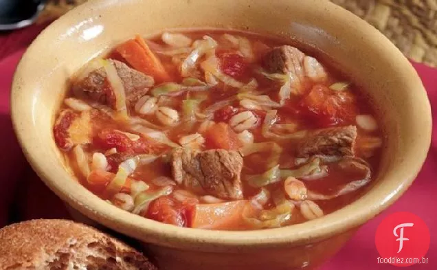 Carne de cominho e sopa de legumes
