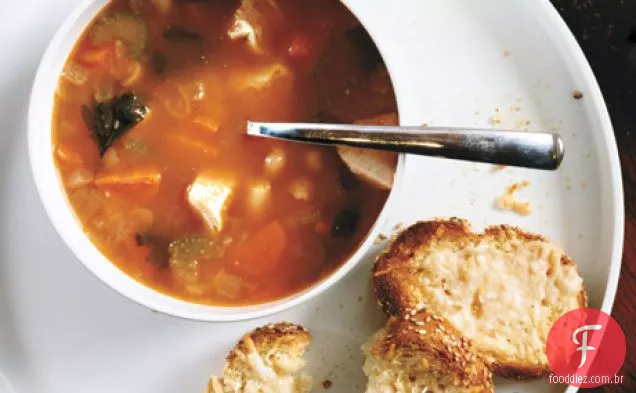 Sopa de frango e feijão branco com redemoinho de ervas