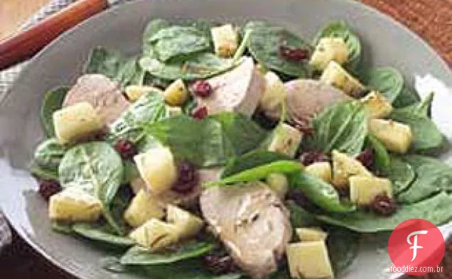 Salada de porco e espinafre com vidro de mel
