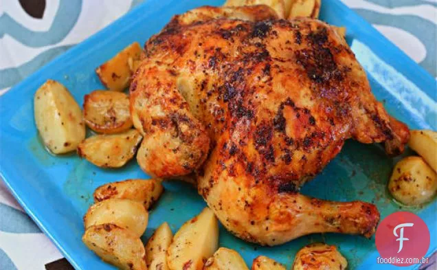 Frango grego assado e batatas em vinagrete de limão-orégano