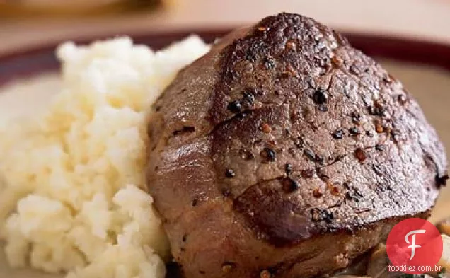 Lombo de carne com molho de cogumelos