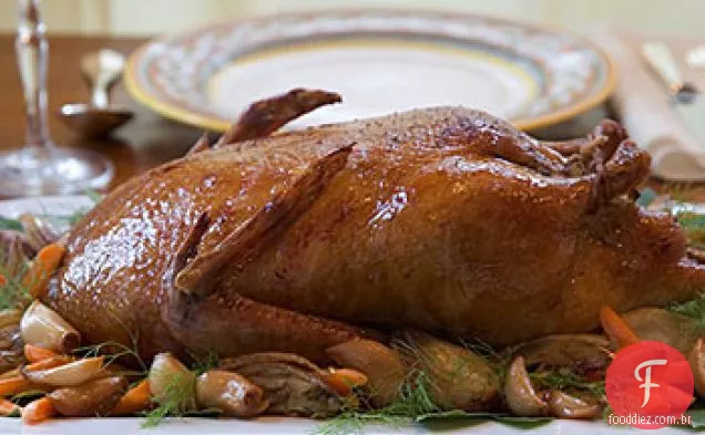 Pato assado lentamente com molho de azeitona e alho-funcho Confit