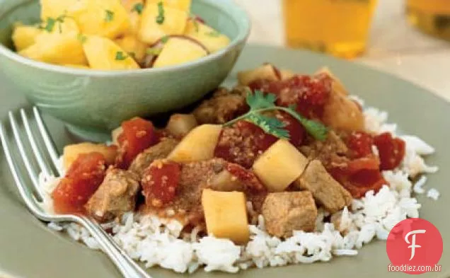 Carne de porco com especiarias indianas em molho de tomate