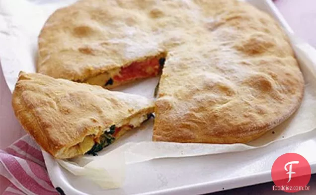 Torta de pizza com presunto, espinafre e alcachofra