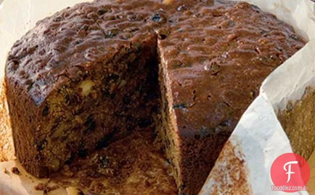 Simmer - & - mexa o bolo de Natal