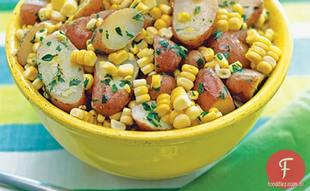 Batatas e milho com manteiga de ervas