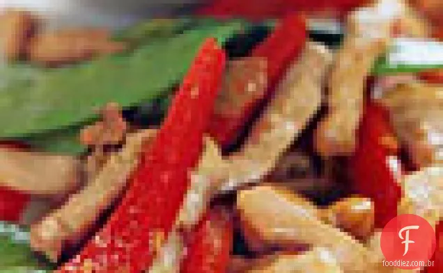 Carne de porco picante e caju refogada com ervilhas e pimenta vermelha