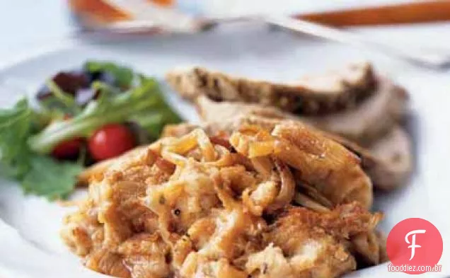 Lombo de porco assado com pudim de Pão de erva-doce saboroso