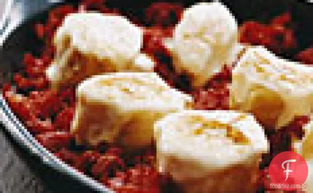 Bacalhau salgado em tomate alho Confit