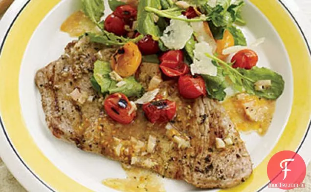 Vieira de vitela com salada de tomate cereja carbonizada