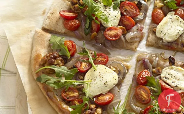 Pizza de rúcula e queijo de cabra