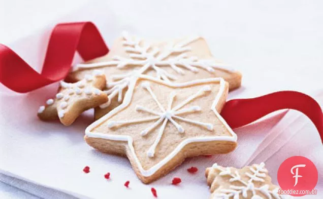 Bolachas de açúcar de Natal com cobertura de baunilha