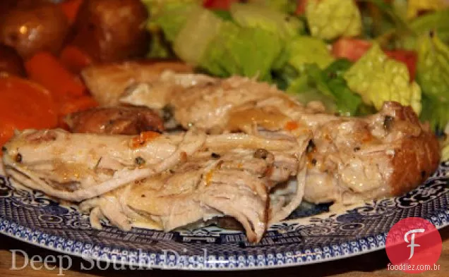 Fogão lento porco assado com legumes