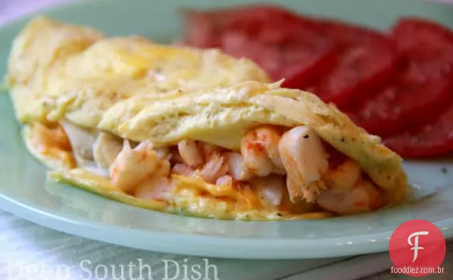 Omelete de frutos do mar com camarão e caranguejo