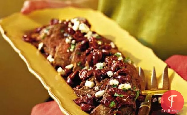 Lombo salpicado com molho Merlot de cereja e Gorgonzola