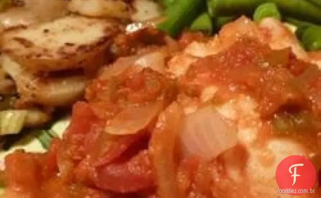 Bacalhau em tomate com vinho