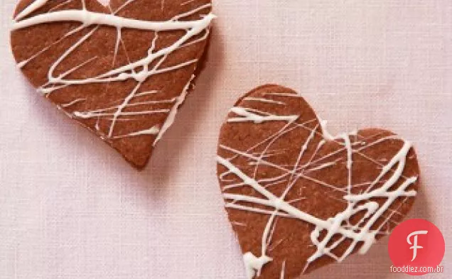 Biscoitos de sanduíche de Chocolate cheios de Ganache Branco