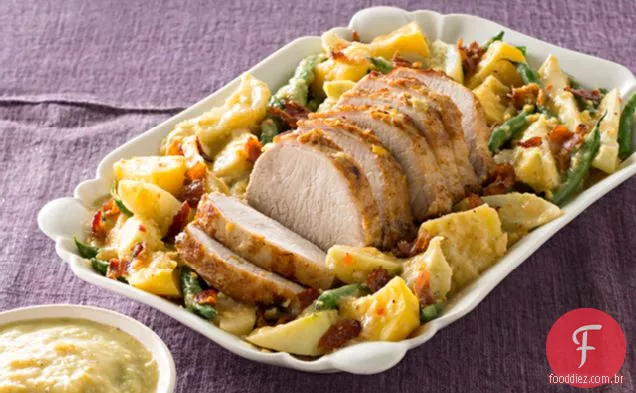 Carne de porco em Toupeira verde com batatas, Chayotes e feijão verde
