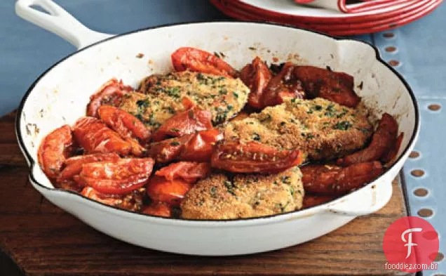 Costeletas de porco com tomates assados na panela