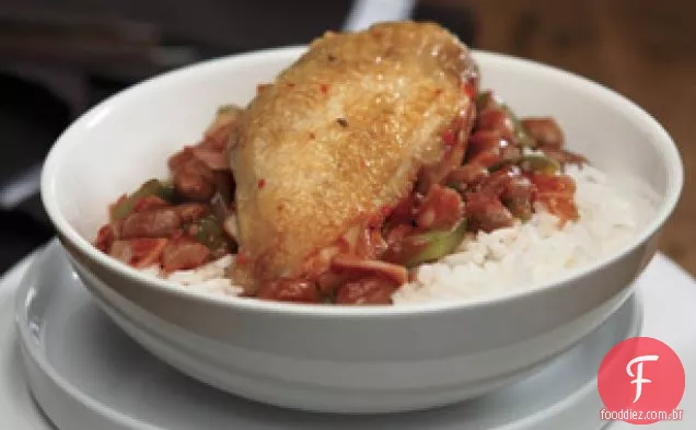 Frango picante com feijão Pinto e arroz