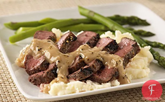 Bife com conhaque e molho de pimenta